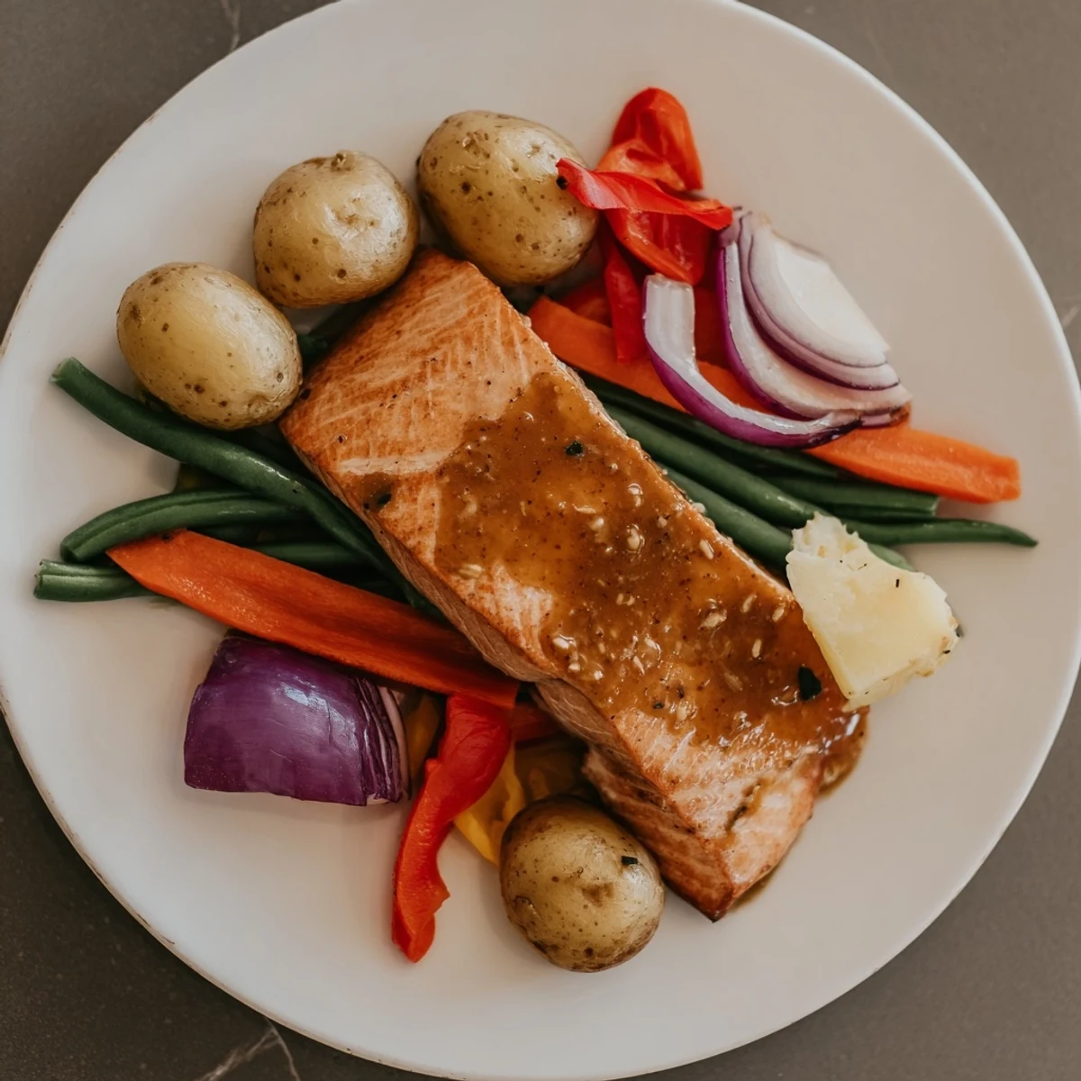 Colorful One-Tray Baked Salmon: Flaky salmon fillets with a sweet-and-tangy honey mustard glaze.