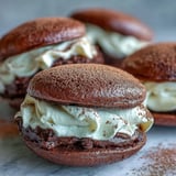 Tiramisu Whoopie Pies with dusted cocoa, perfect for coffee lovers and celebrations.