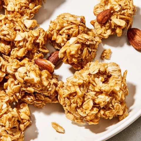 Close-up of freshly baked Honey Nut Granola Clusters, showing a delightful mix of textures.