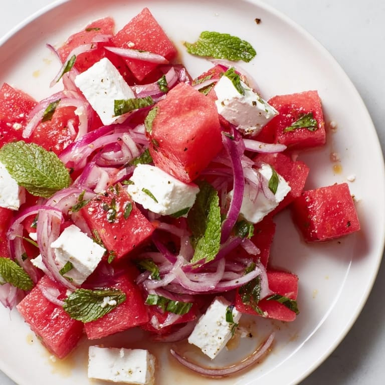 Bright, refreshing Watermelon Feta Salad: a close-up of the Mediterranean-inspired delight in a bowl.